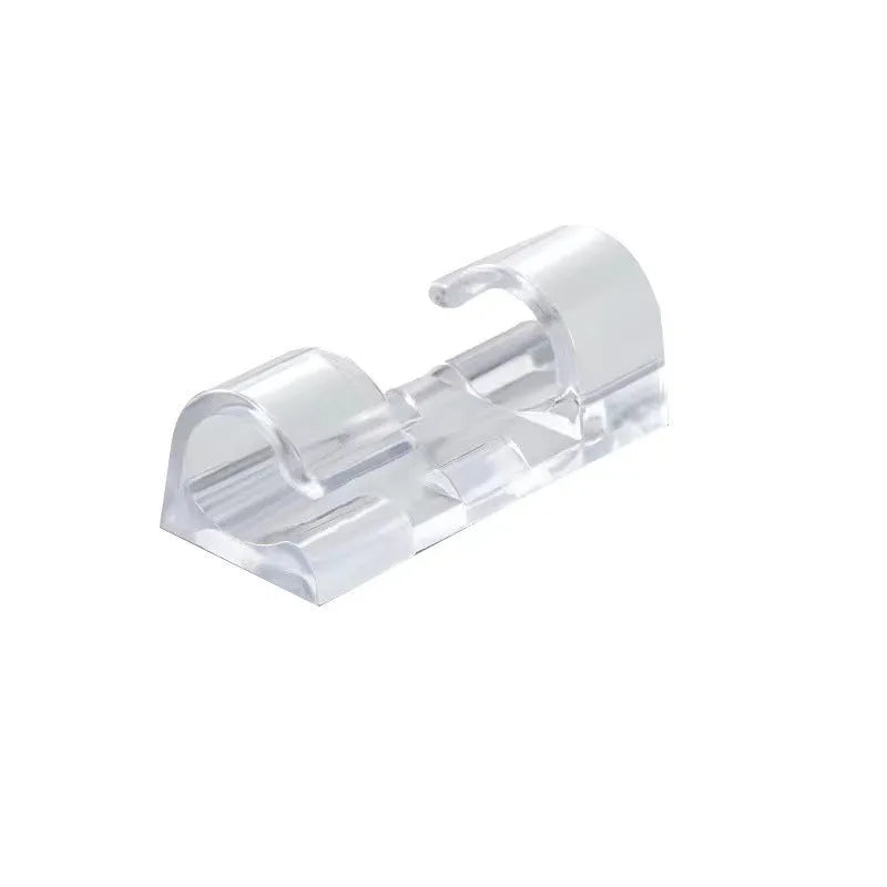 Transparent self-adhesive plastic cable clips in small, medium, large, and extra large sizes for wire management.