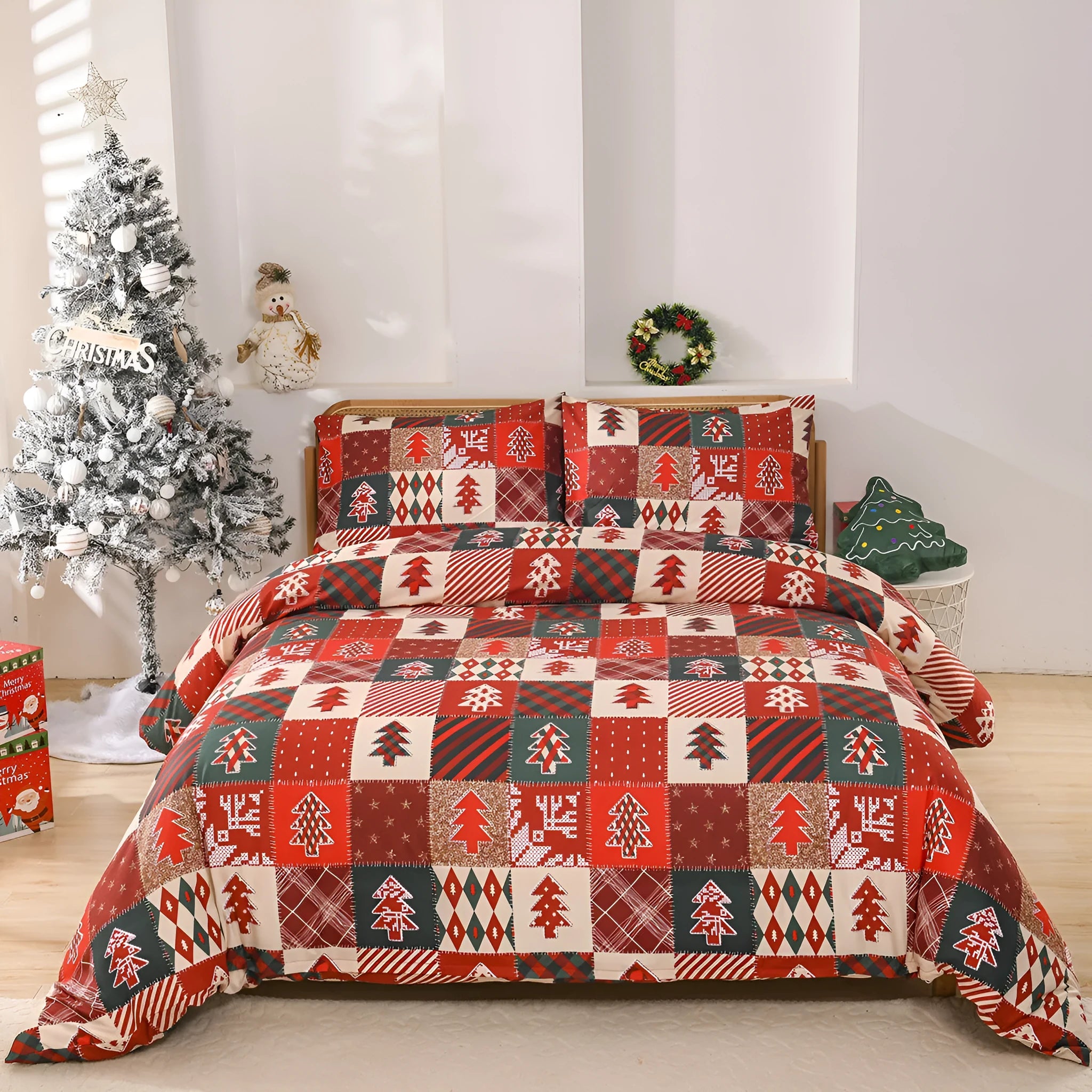 Red and black plaid Christmas pattern quilt cover and pillowcases on a bed.