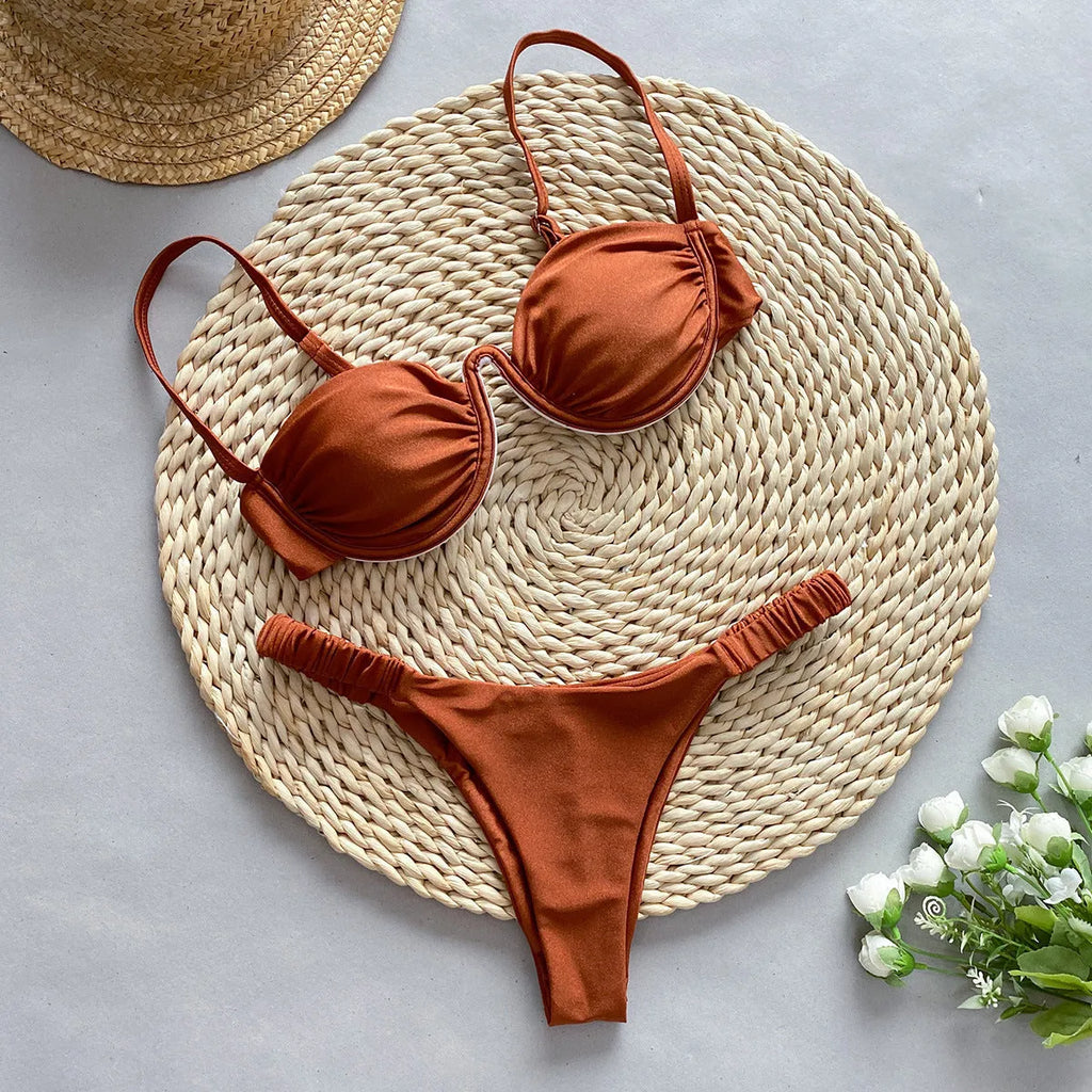 Women's khaki underwire bikini swimsuit with split bottom briefs on a mannequin.