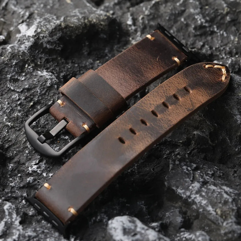Brown handmade top layer cowhide watch strap with stainless steel buckle on a watch