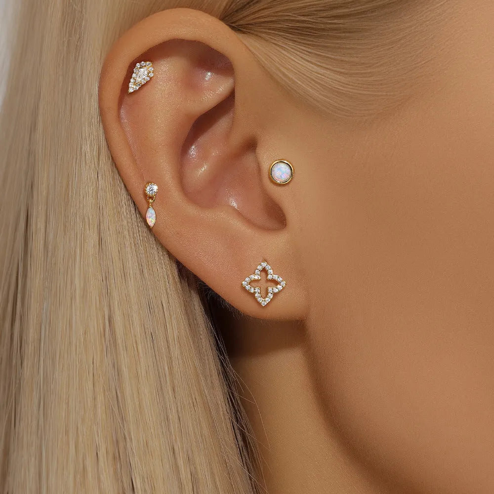 S925 sterling silver flat column ear bone stud in a gold tone colour on a white background.