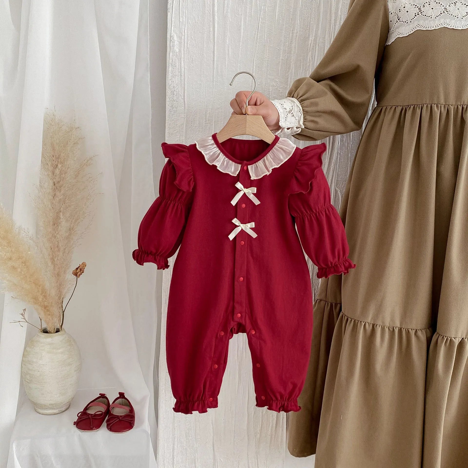 Red cotton baby jumpsuit with long sleeves and double-breasted front, suitable for girls aged 66cm to 90cm