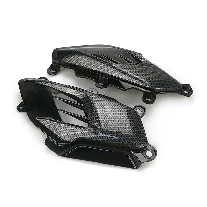 Yamaha NMAX scooter side lamp LED replacement kit with carbon fibre decoration showing blue and red light options