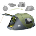 Dark green instant pop-up two-person camping tent shown pitched outdoors.