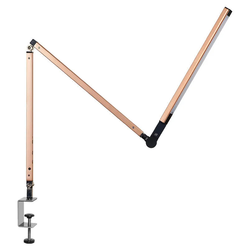 Black clip mount LED desk lamp with dimmer switch attached to study desk edge