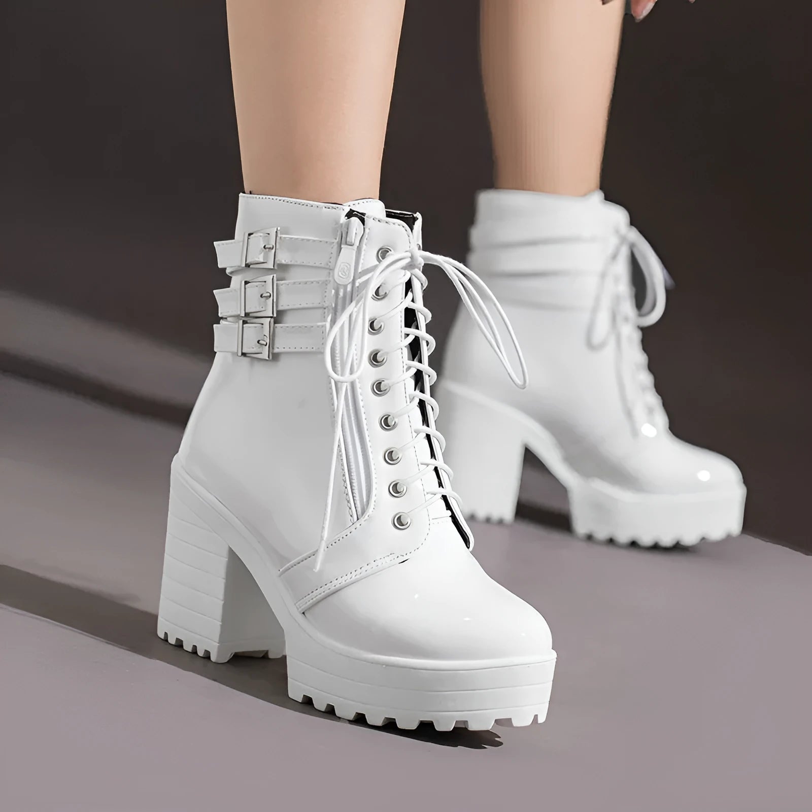 Women's black thick-heeled short boots with lace-up front, round toe, and waterproof platform sole