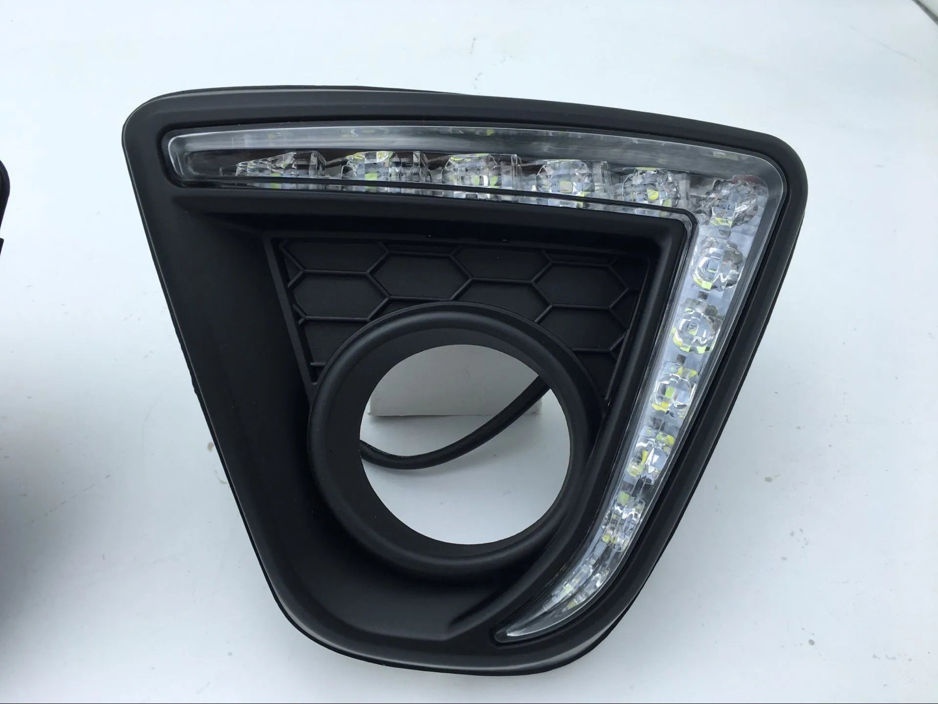 Mazda CX-5 replacement LED daytime running light bulbs with electroplated housing.