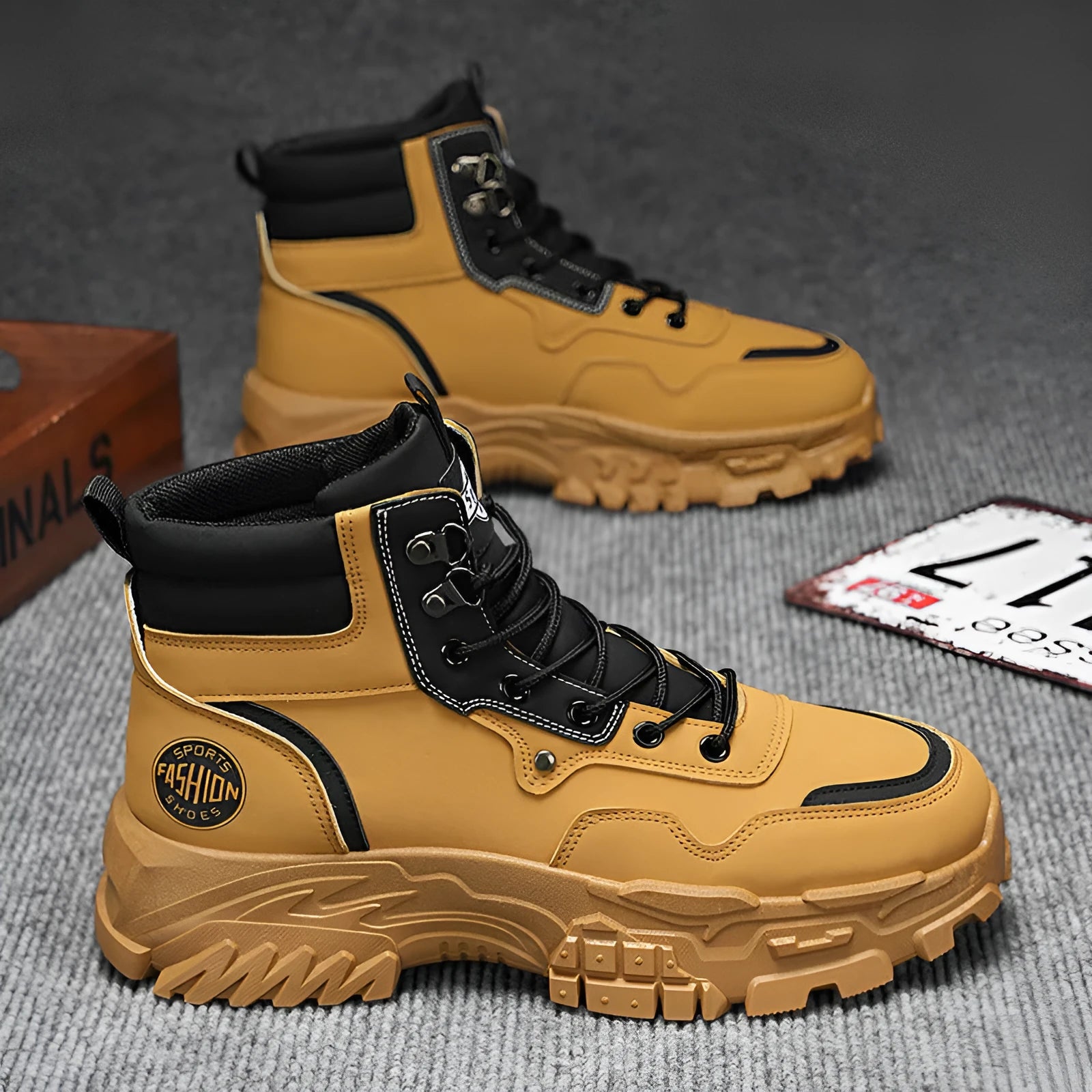 Men's black and yellow Martin work boots showing mid-calf height and stout heel.