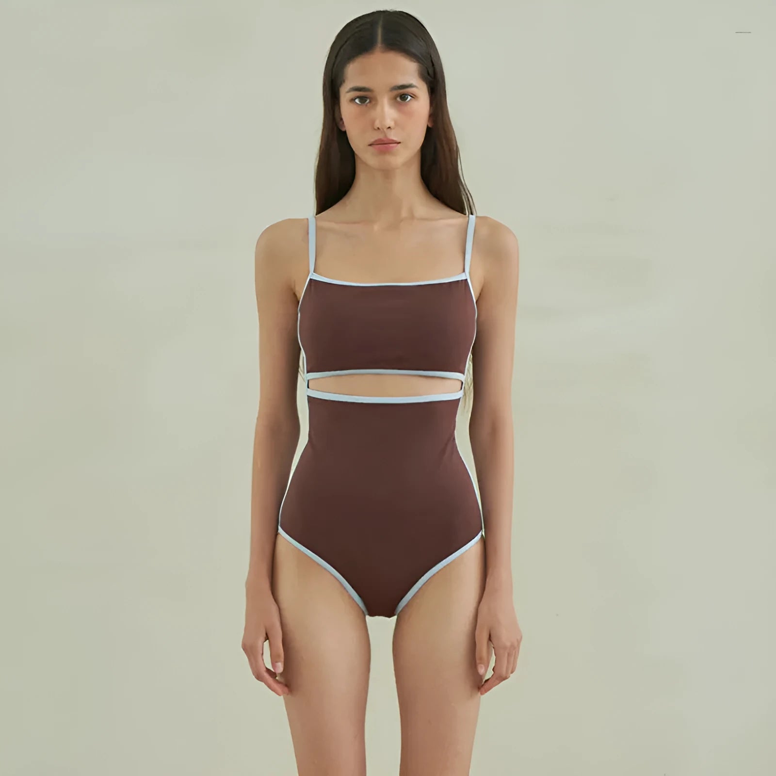 Brown women's one-piece swimsuit with triangle top design