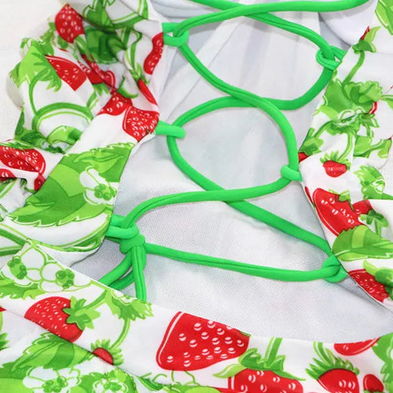 Women's one-piece swimsuit with cross strap backless design and strawberry print in blue strawberry colour