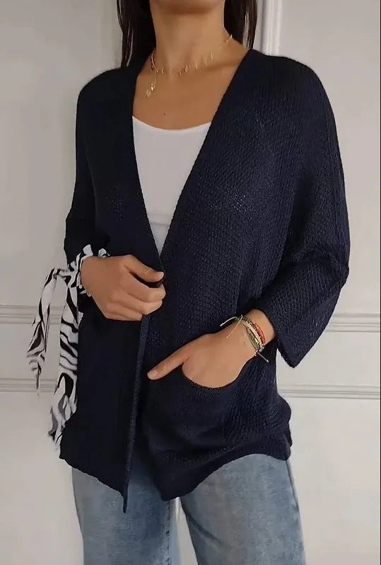 Women's waffle pattern cardigan coat in army green with nine-quarter sleeves and pocket details