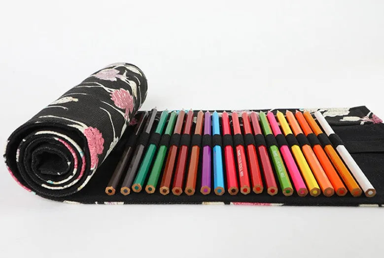 Square canvas rolling pencil case with ballet girl print, showing multiple pencil holes inside.