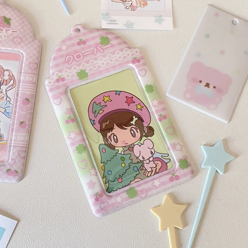 Cartoon plaid PVC card holder pendant in strawberry and four-leaf clover styles for 3-inch cards.