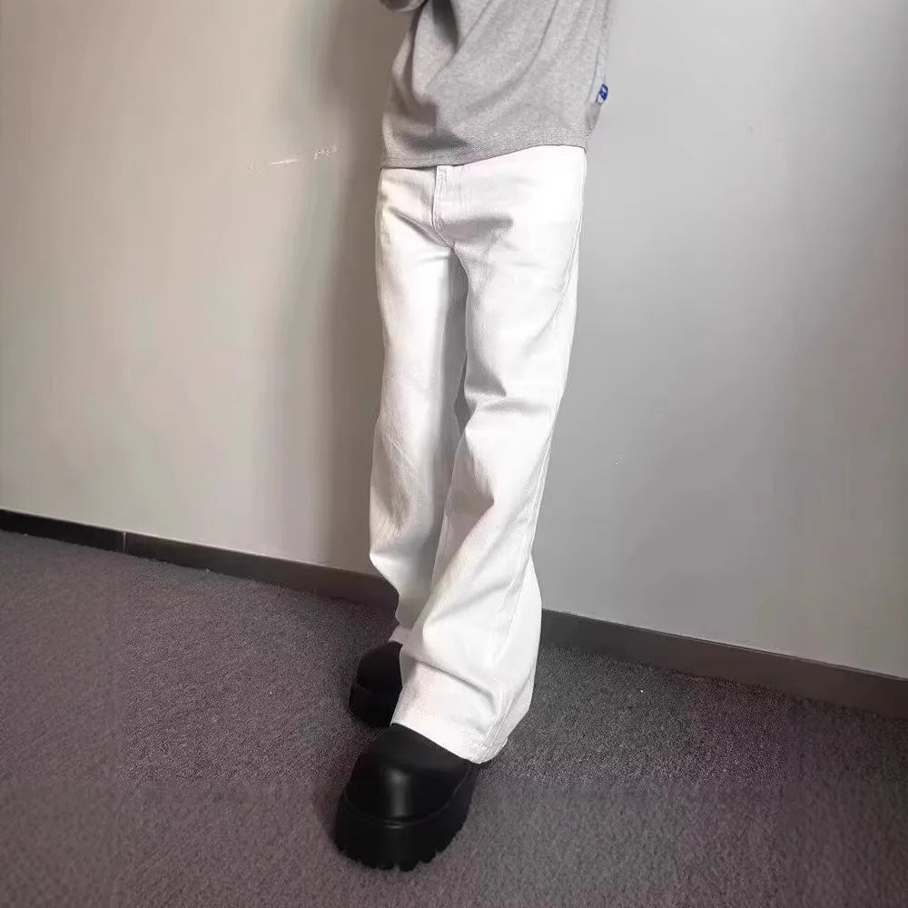 Men's white straight-leg denim jeans with wide leg opening and zip fly