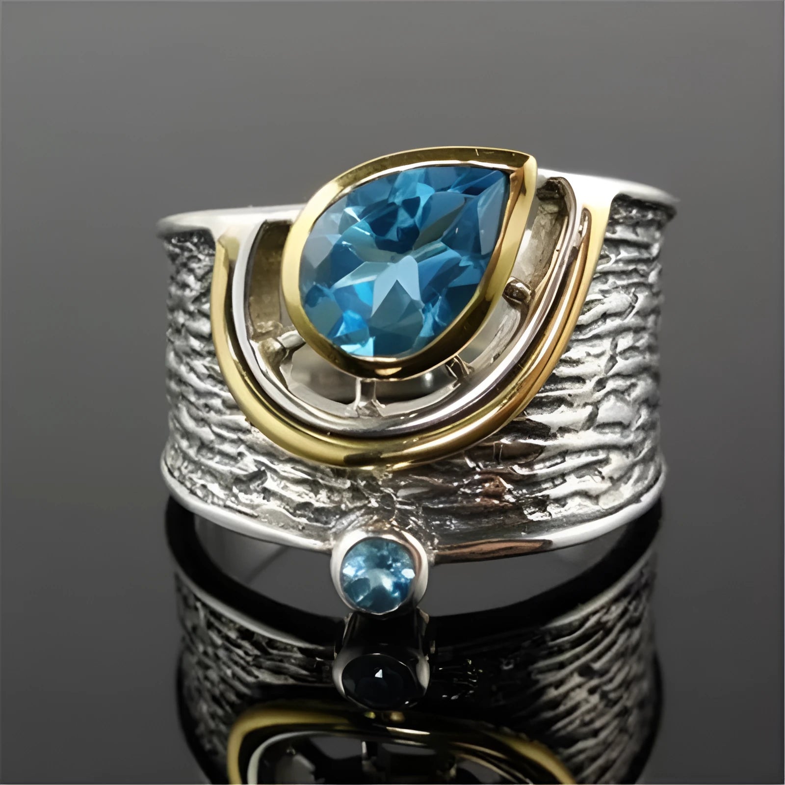 Blue Chinese style drop shape ring with rhinestone zircon inlay on alloy band showing women's jewellery
