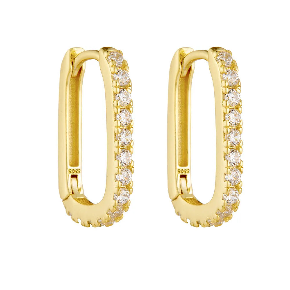 Close-up of a women's sterling silver earring featuring an oval-cut zircon stone.