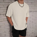 Men's slim fit solid colour polyester t-shirt in black, white, light blue, or khaki options