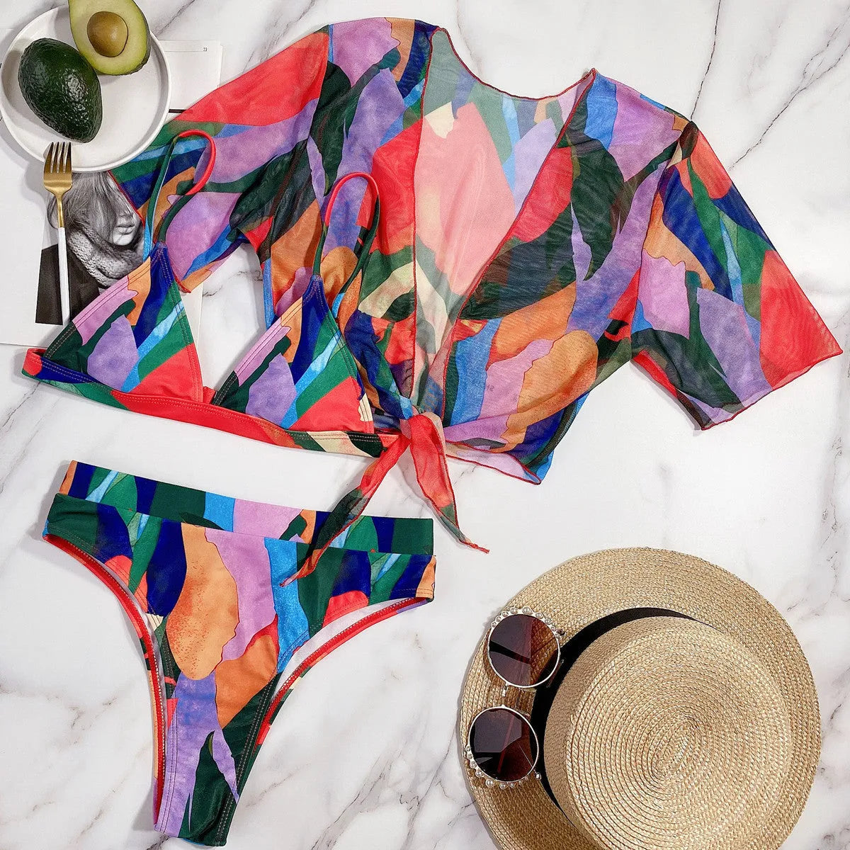 Red women's split swimsuit, a nylon bikini in a casual surfing style.