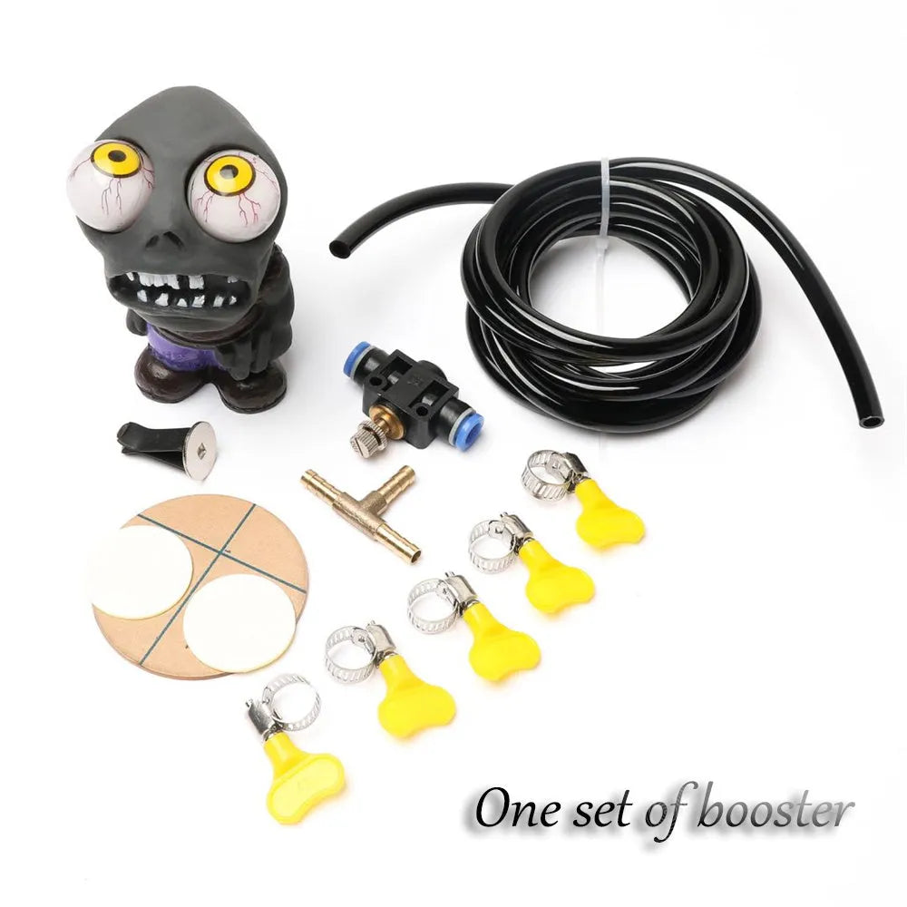 Turbo car blow-off valve ornament kit showing rubber doll, pressure valve, copper connectors and tubing
