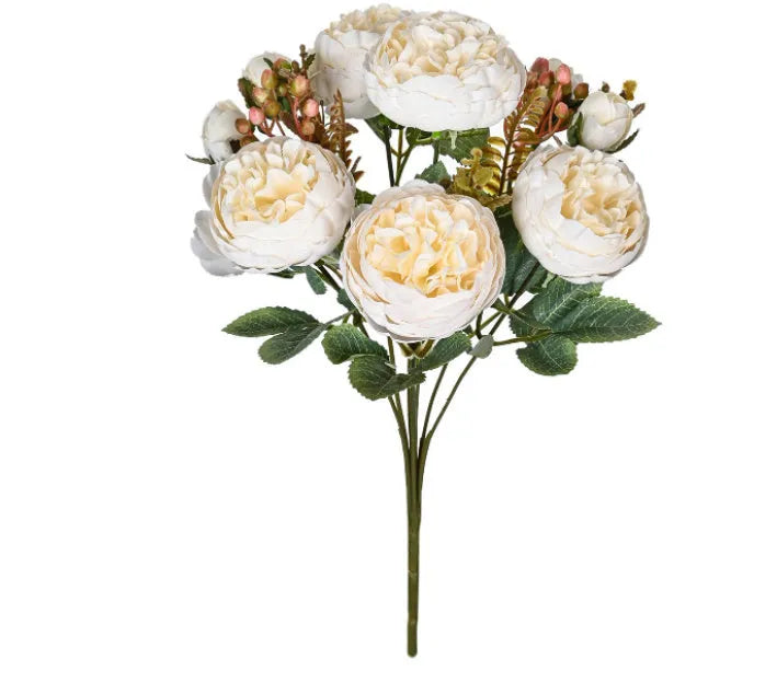 Silk artificial peony bouquet in champagne colour for wedding or home decoration.