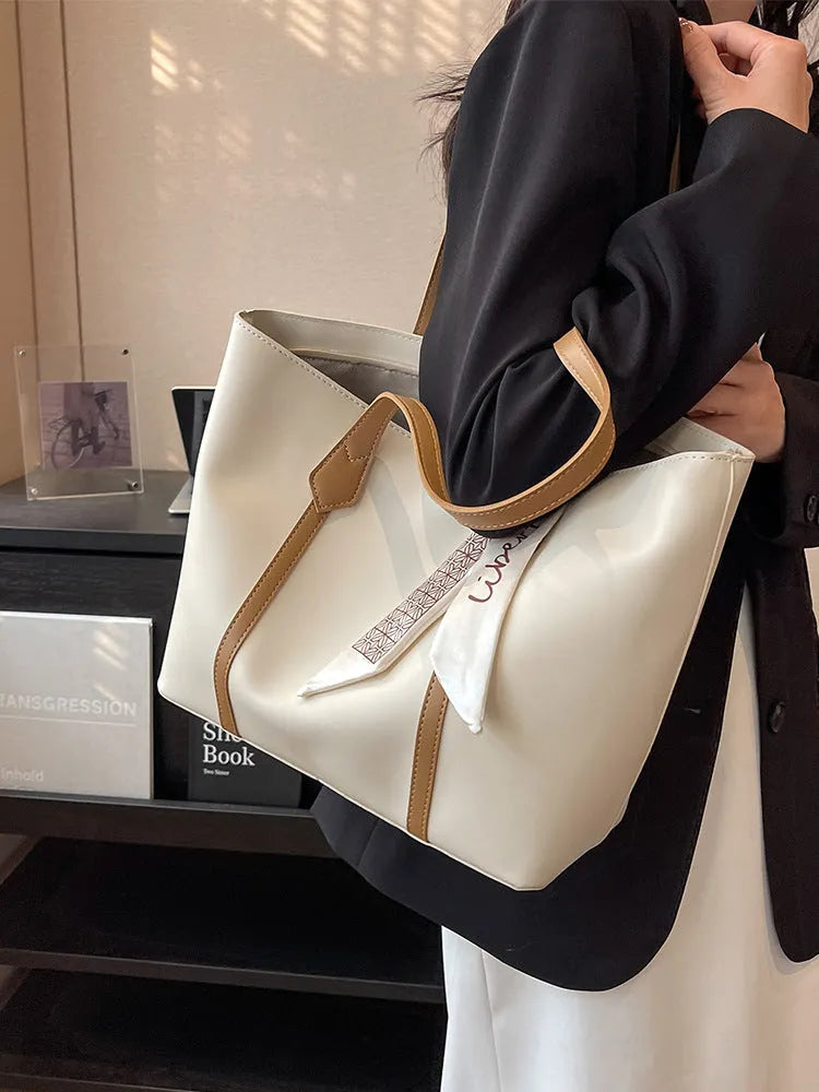 Women's large-capacity soft bucket shoulder bag in multiple colour options with zipper pocket