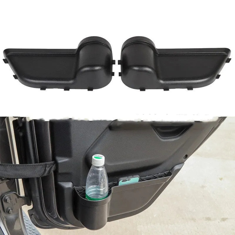 Black ABS plastic storage box mounted on a Jeep Wrangler interior door panel.