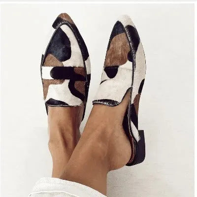 Women's black and white apricot retro pointed-toe low heel shoes with suede imitation horse hair pattern.