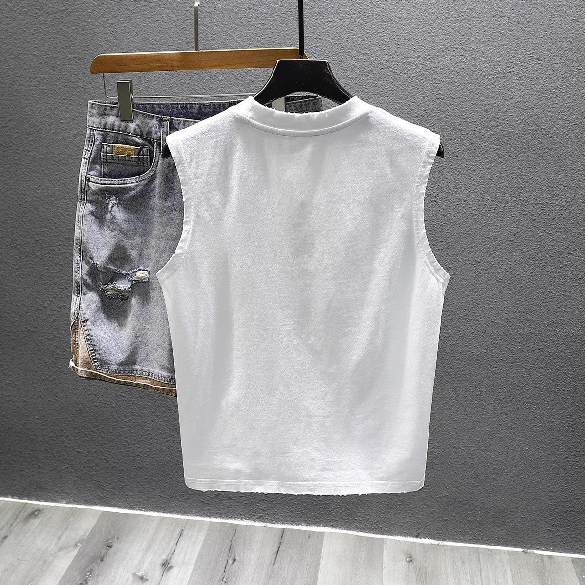 Cotton sleeveless t-shirt loose fit in black or white colour with straight hem design