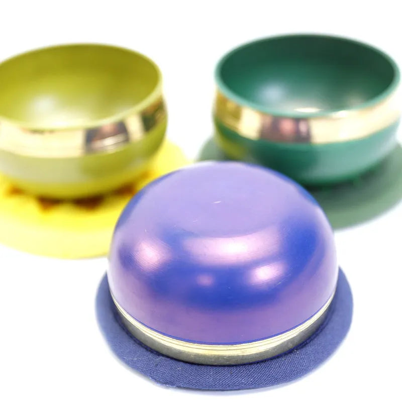 Small handmade wooden singing bowl in a choice of seven colourful, hand-painted designs.