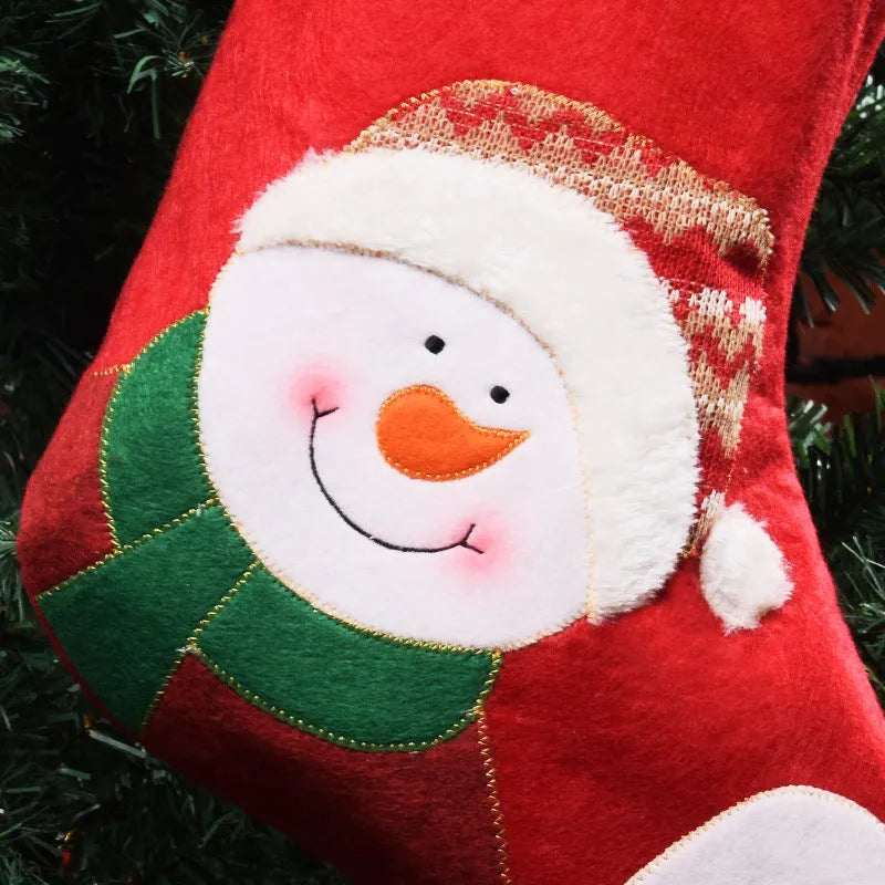Non-woven fabric Christmas stocking decorations in Elk, Old Man, and Snowman designs.