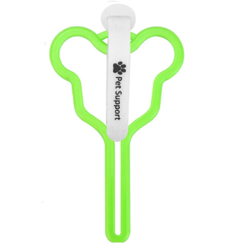 A hands-free dog poop bag holder with a fixed clip and adjustable black Velcro strap, shown attached to a dog lead.