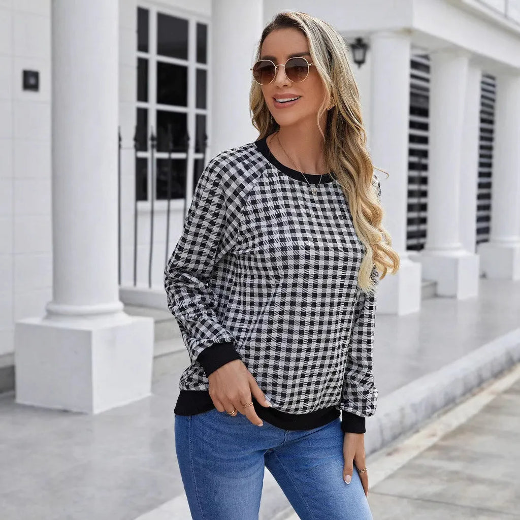 Black long sleeve pullover sweater with a printed Japanese plaid pattern