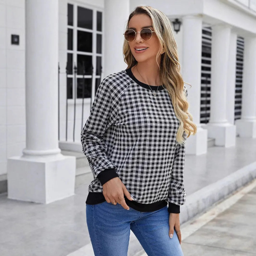 Black long sleeve pullover sweater with a printed Japanese plaid pattern