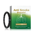 Men's bracelet made of clear glass and dark black gallstone stones on a wrist.