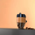 Solid coffee cup shaped car air freshener in black, brown, white, orange or green colour options.