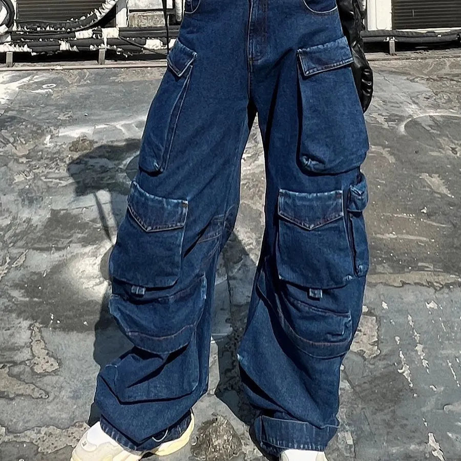 Dark blue distressed wide-leg women's jeans with high waist and multiple pockets.