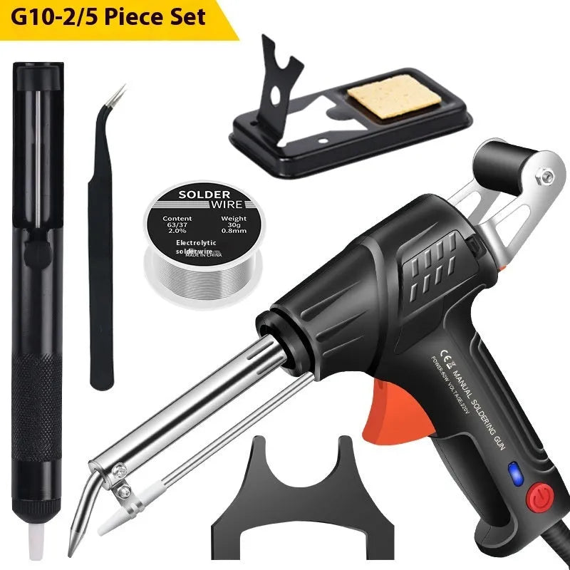 Black G102 alloy soldering gun with light, part of a five-piece kit on a workbench.