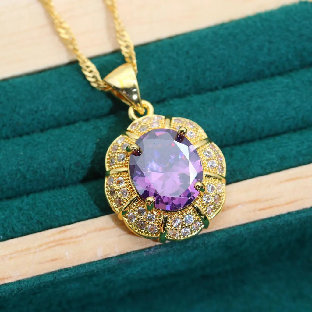 18k gold plated zircon jewellery set showing necklace, earrings, ring and bracelet with coloured cubic zirconia stones