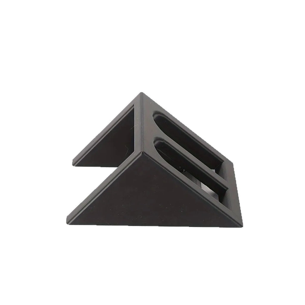 Black punk-style plastic pistol stand measuring 10.85 by 7.6 centimetres