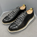 Men's white low-top casual shoes with a patterned embossed upper and front lace closure.