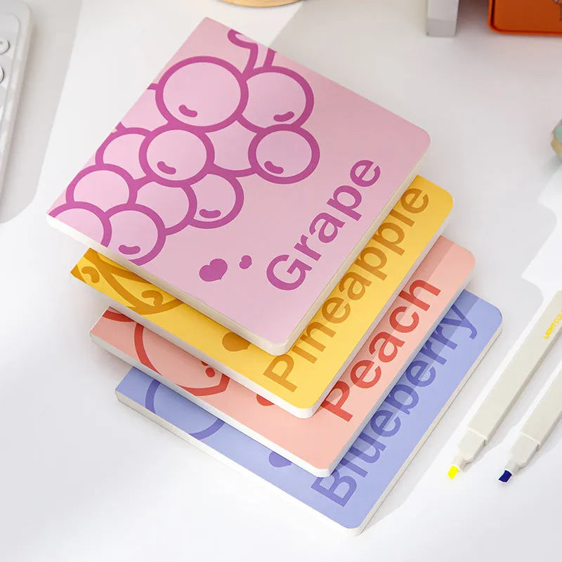 Square fruit notebook with colourful embossed pineapple design cover measuring 14.5cm