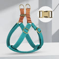 Brown vest-style dog leash harness made from cotton and nylon with metal clasp