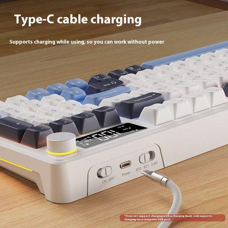 Blue and white wireless mechanical-feel keyboard and mouse set on a wooden desk