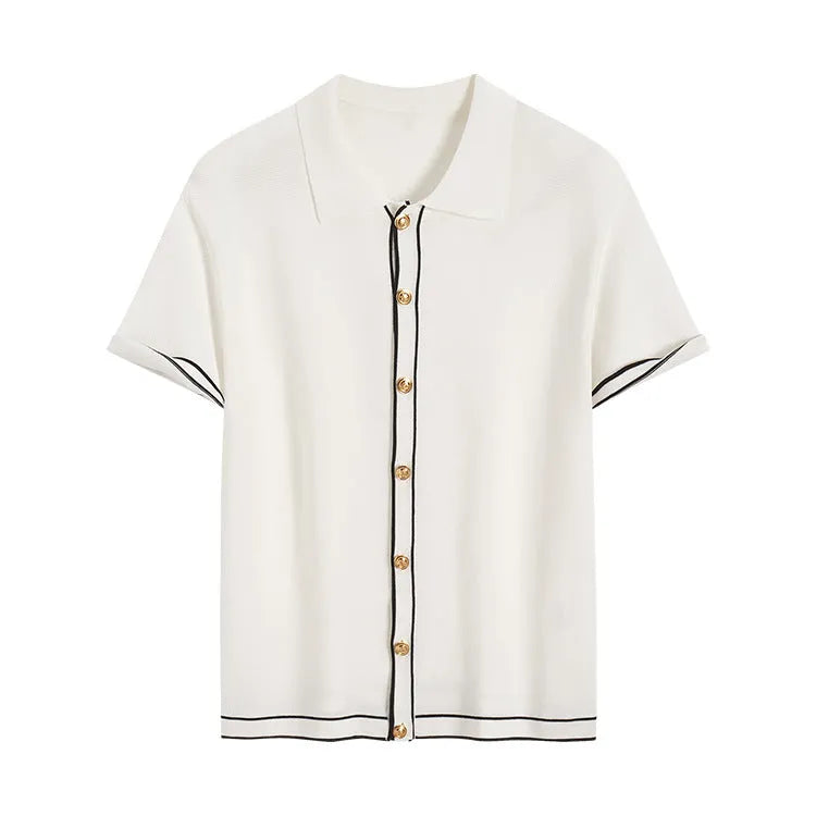 White women's short-sleeve cardigan with contrasting colour lapels laid flat.