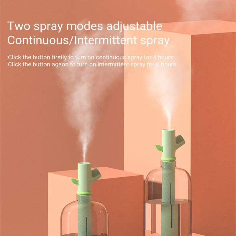 Transparent plastic USB portable humidifier with water tank showing mist output