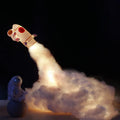DIY astronaut rocket LED night light kit components including small model, straws, chassis, and string lights for assembly.