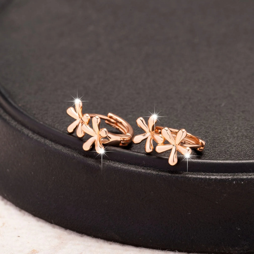 Rose gold electroplated waterdrop flower earrings with circular design and butterfly backs