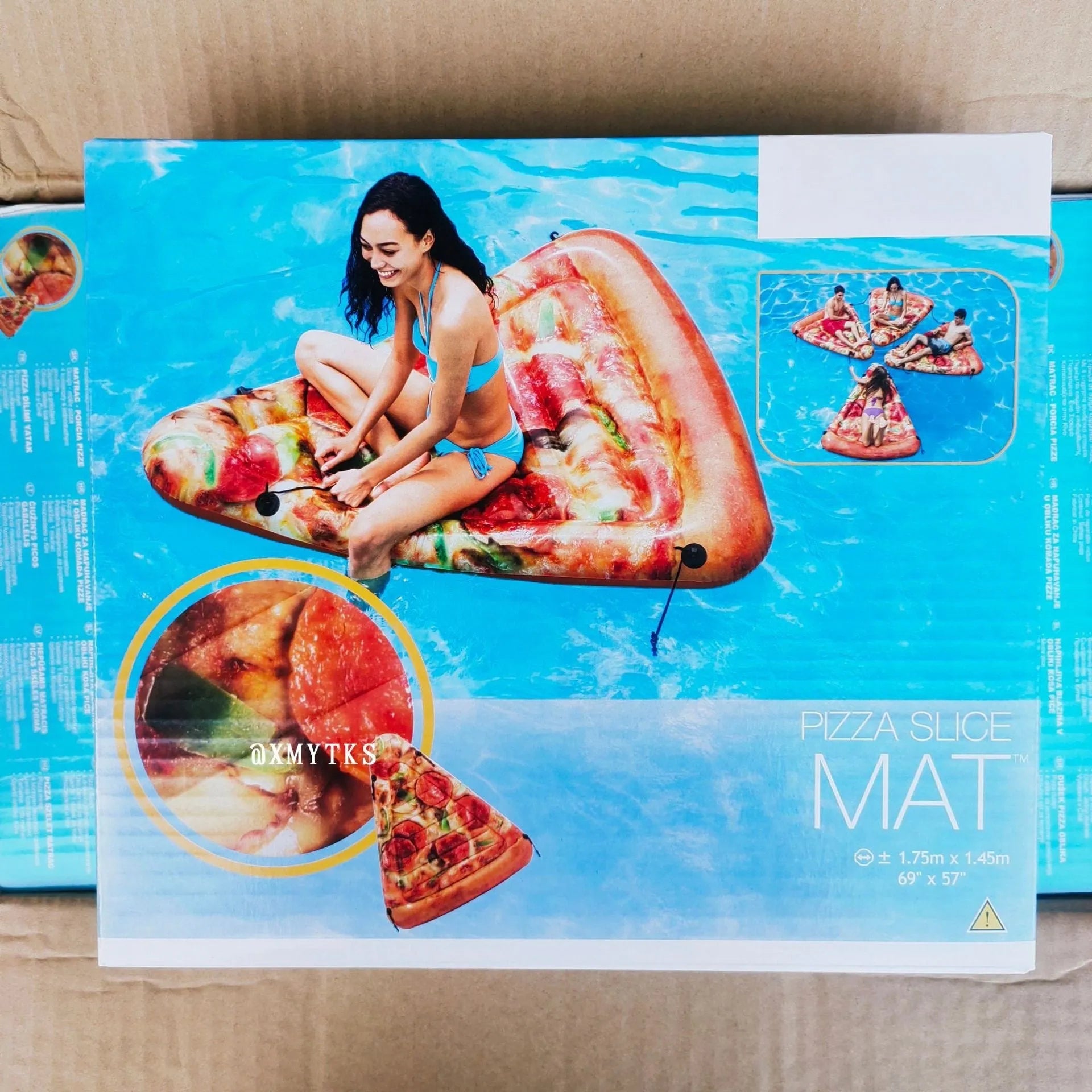 Large inflatable pizza slice float measuring 175cm x 145cm made of PVC for pool use