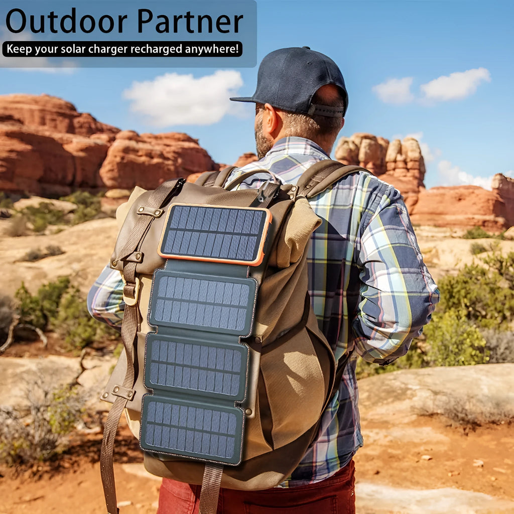 Black outdoor solar phone charger with leather exterior, solar panel, and LED light.