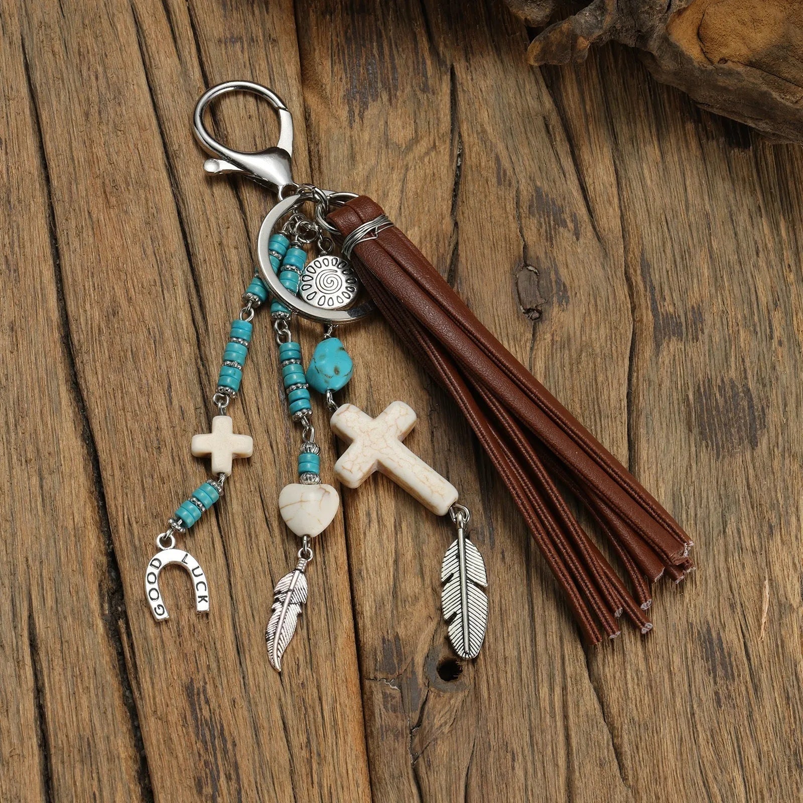 Cross alloy leather tassel pendant keychain in retro style, colour XY-3669, on a neutral background